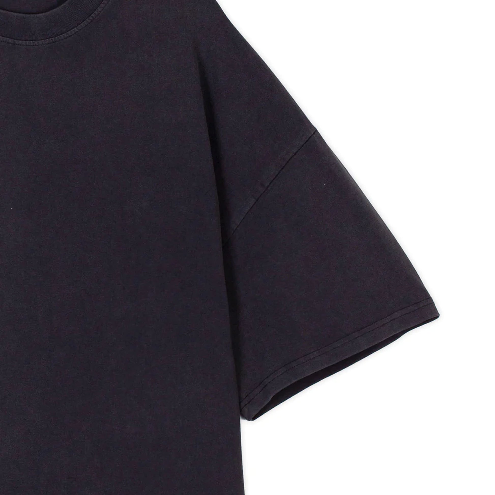  Flat product image of an oversized vintage black t-shirt sleeve.